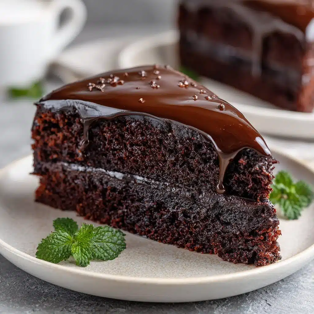 Indulge in Decadence: Death by Chocolate Cake Recipe 3 Decadent Death by Chocolate Cake topped with rich chocolate frosting