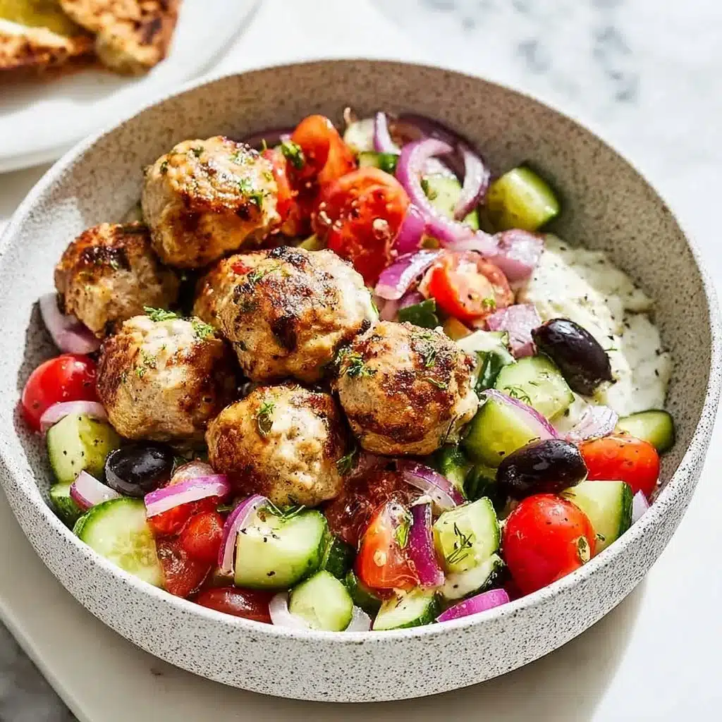 Delightful Greek Chicken Meatballs with Homemade Tzatziki 3 Plate of Greek chicken meatballs served with homemade tzatziki sauce